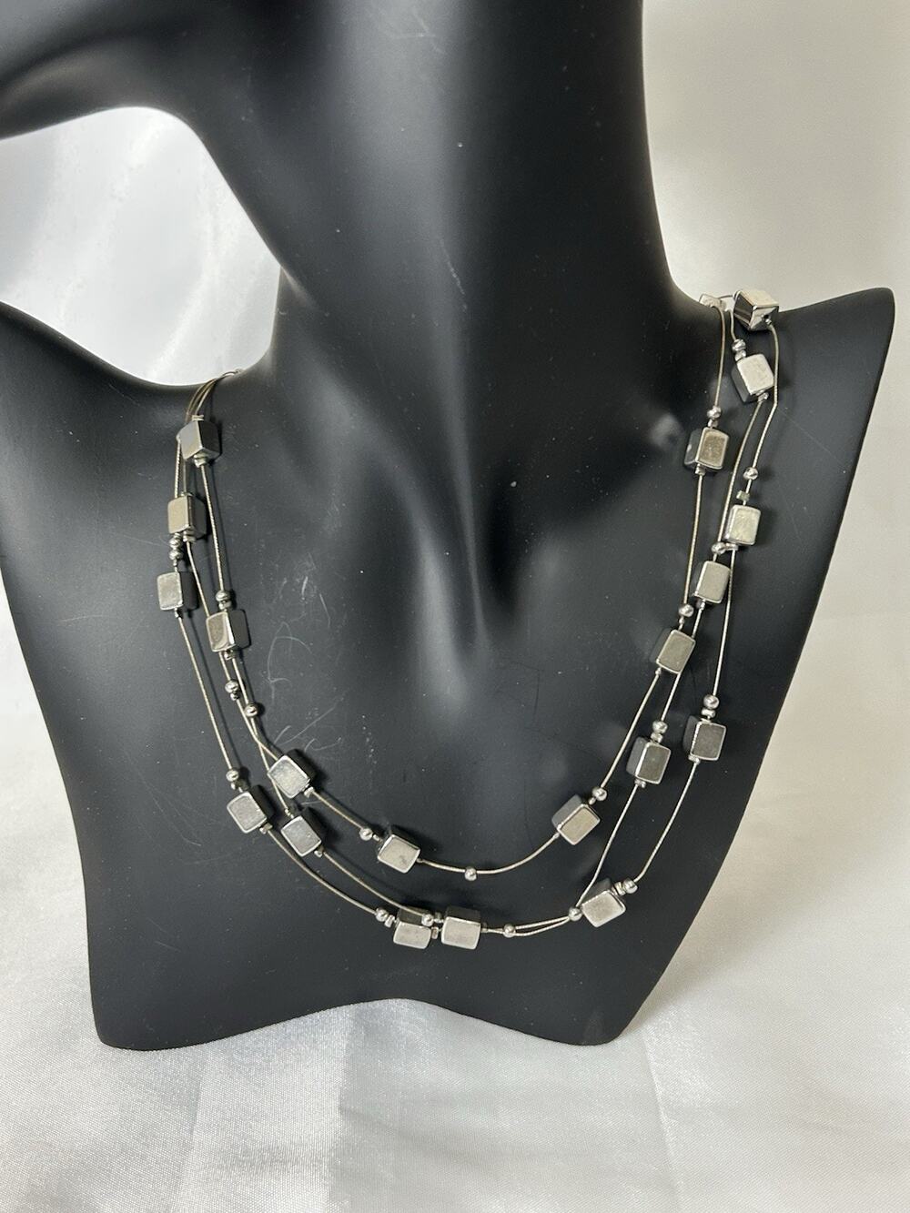 Cute Silver Tone Lia Sophia Multi-Strand Necklace. Measures 19